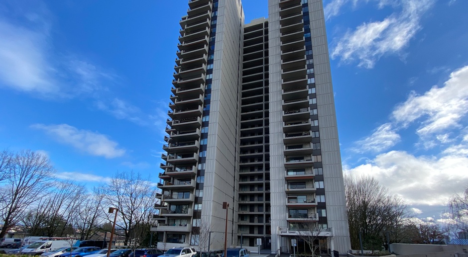 Lovely 2 Bedroom / 1 Bathroom Condo with Beautiful Updates and Views! ~ Minutes from OHSU, PSU! This Beautiful Condo includes One Garage Parking Space + A Storage Room! and so much more!!!