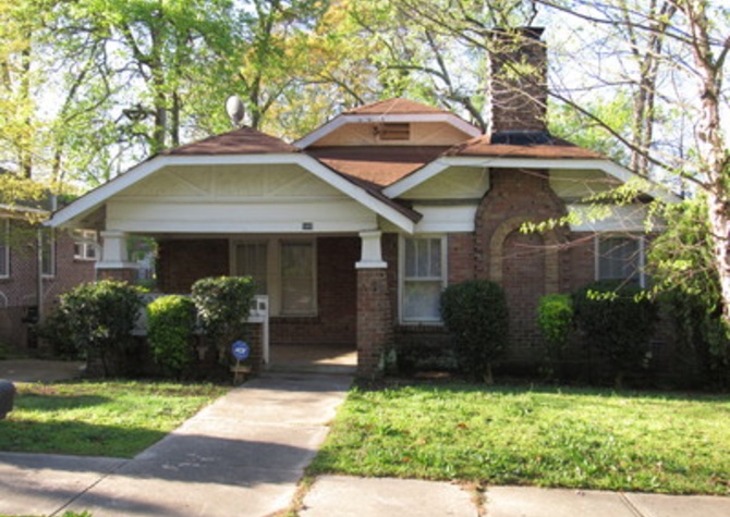 Houses Near Bungalow Style 3-Sided Brick Home