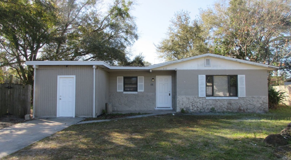 West Altamonte 4 bedroom house with 2.5 baths  with large screen porch has fenced yard and detached storage shed