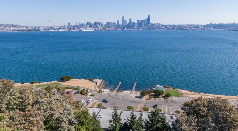 Enormous Waterfront Alki Condo with Stunning City Views and rare secure parking for two cars!