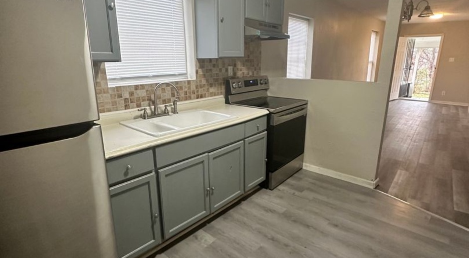 2128 E 82nd Ter | $1000 | 2 Bed, 1 Bath with Attached Garage