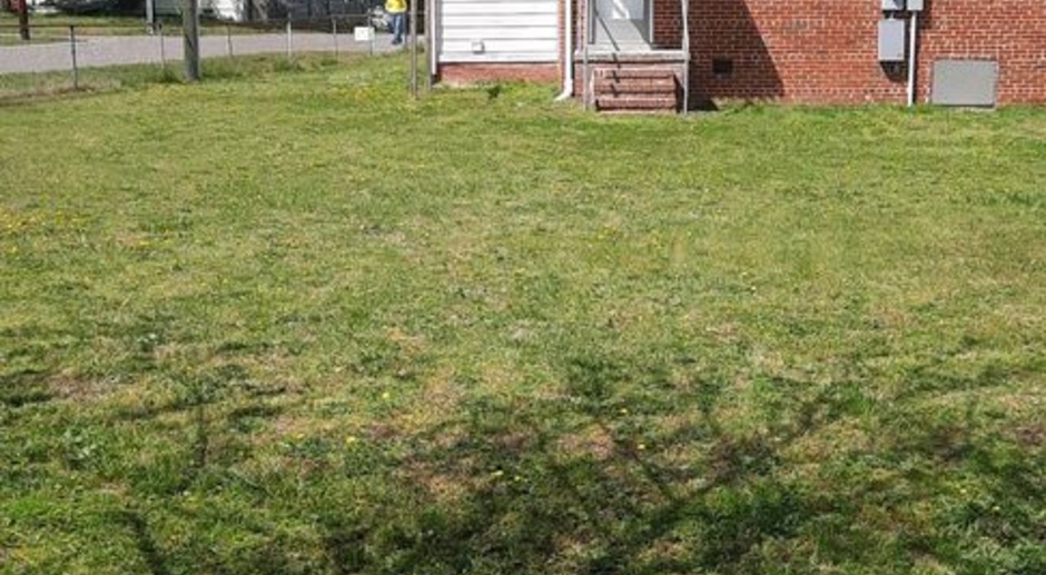 Remodeled 3 bedroom brick cape in Lakeside with huge back yard and detached garage.